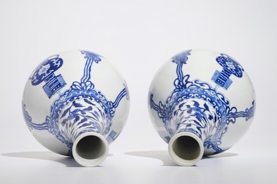 A pair of Chinese blue and white bottle vases, Kangxi