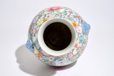 A Chinese famille rose millefleurs hu vase, Qianlong mark, 19/20th C.