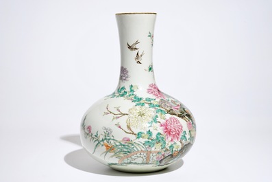 A fine Chinese famille rose vase with birds, flowers and butterflies, 19/20th C.