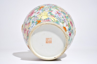 A Chinese famille rose millefleurs hu vase, Qianlong mark, 19/20th C.