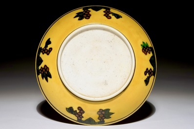 A Chinese yellow-ground dragon saucer dish, Kangxi