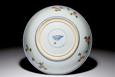A Chinese famille verte dish with a flower basket, Kangxi