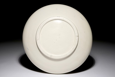A Chinese Dehua blanc de Chine dish with incised floral design, Kangxi