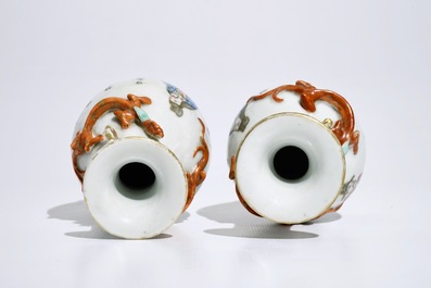 A pair of Chinese famille rose Wu Shuang Pu vases, 19th C.