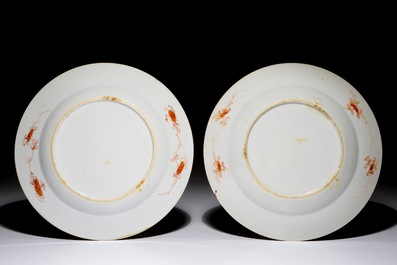 A pair of Chinese Imari style plates with a lady on a donkey, Kangxi