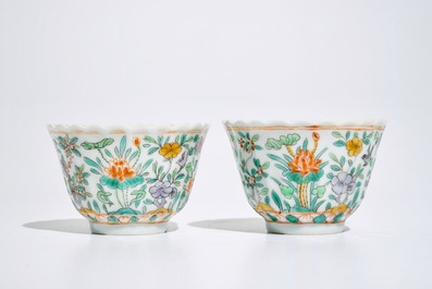 A pair of Chinese famille verte cups and saucers, Kangxi