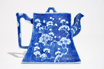 A Chinese blue and white "prunus and ice" teapot and cover, Kangxi mark, 19th C.