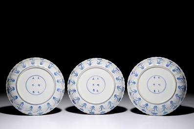Three Chinese blue and white fluted plates with a Mongolian hunting scene, Chenghua marks, Kangxi