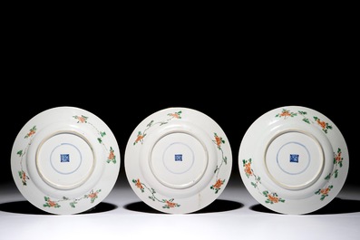 Three Chinese famille verte plates with a phoenix and a qilin, Kangxi