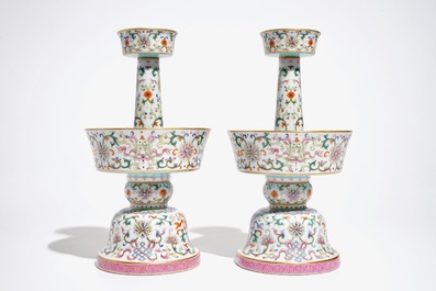 A pair of Chinese famille rose candlesticks, Jaiqing mark, 19/20th C.