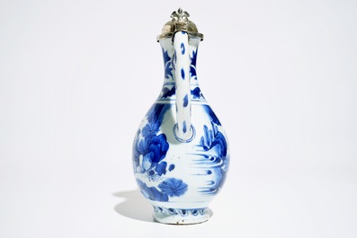 A Chinese blue and white silver-mounted jug, Transitional period