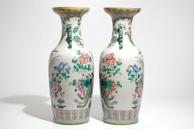 A pair of Chinese famille rose vases with pheasants and peacocks, 19th C.