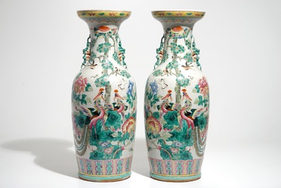 A pair of Chinese famille rose vases with pheasants and peacocks, 19th C.