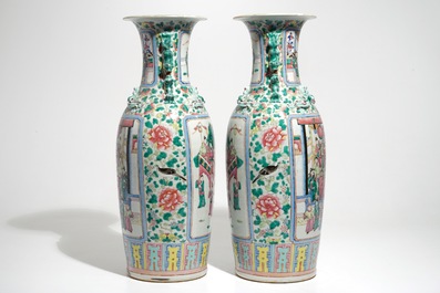 A pair of tall Chinese famille rose vases with court scenes, 19th C.