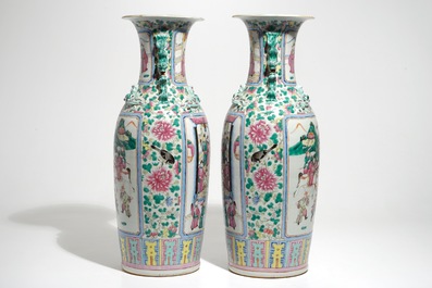 A pair of tall Chinese famille rose vases with court scenes, 19th C.