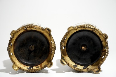 A pair of bronze-mounted Chinese Canton famille rose vases, transformed into lamps, 19th C.