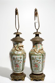 A pair of bronze-mounted Chinese Canton famille rose vases, transformed into lamps, 19th C.