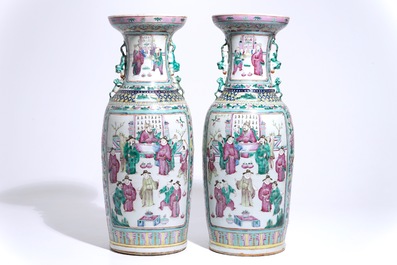 A pair of tall Chinese famille rose vases with figural design, 19th C.