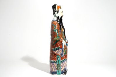 A tall Chinese famille rose figure of an immortal, 19th C.