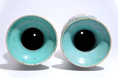 A pair of tall Chinese famille rose vases with figural design, 19th C.