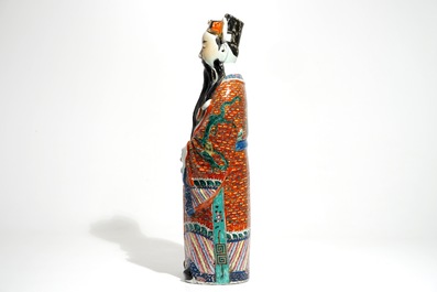 A tall Chinese famille rose figure of an immortal, 19th C.