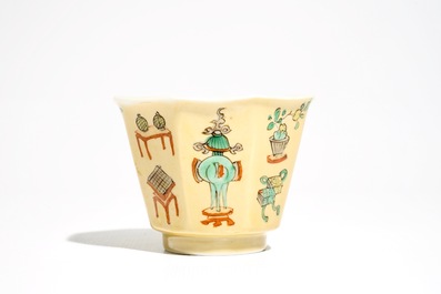 A Chinese famille verte caf&eacute; au lait-ground cup and saucer, Kangxi