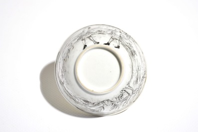 A Chinese grisaille cup and saucer with Europeans, Yongzheng