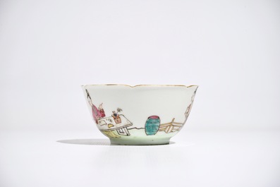 A Chinese famille rose mandarin cup and saucer, Qianlong