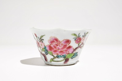 A Chinese famille rose cup and saucer with floral design, Yongzheng/Qianlong