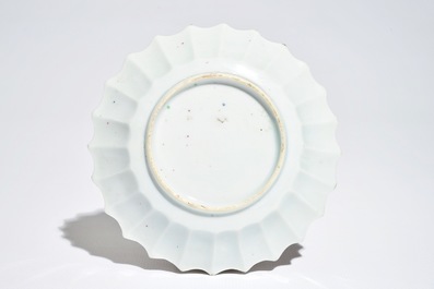 A Chinese lobed famille rose cup and saucer, Yongzheng
