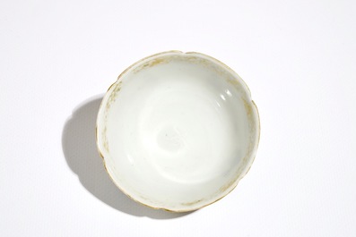 A Chinese famille rose mandarin cup and saucer, Qianlong