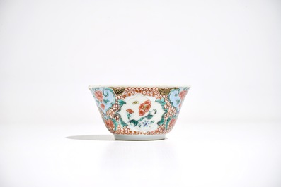 A Chinese famille rose cup and saucer, Yongzheng