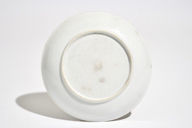 A Chinese famille rose cup and saucer with a cat, Yongzheng