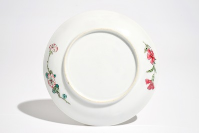 A Chinese famille rose cup and saucer, Yongzheng