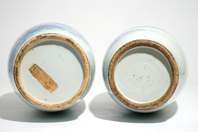 Two tall Chinese blue and white landscape vases, 19/20th C.