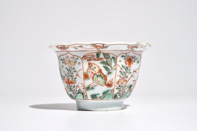 A Chinese famille verte cup and saucer with egrets, Kangxi