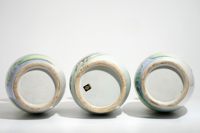 A pair of Chinese famille rose vases with goats and one with roosters, 20th C.
