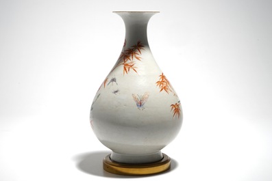 A Chinese famille rose bronze-mounted yuhuchunping vase, Qianlong mark, 19/20th C.