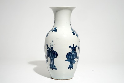 A Chinese blue and white vase with incense burners and furniture, 19/20th C.