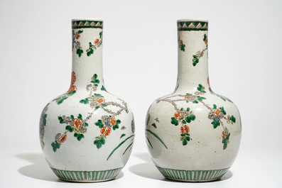 A pair of Chinese famille verte bottle vases, 19th C.