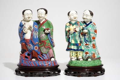 Two tall Chinese famille rose groups of the Hehe Er Xian brothers, 19/20th C.