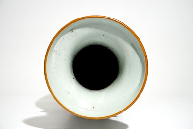 A tall Chinese famille rose vase with a fine circular design, 19th C.