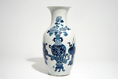 A Chinese blue and white vase with incense burners and furniture, 19/20th C.