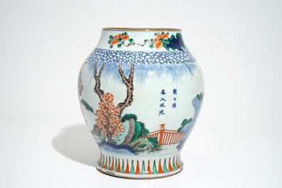 A Chinese olive-shaped wucai vase with figures, 19th C.