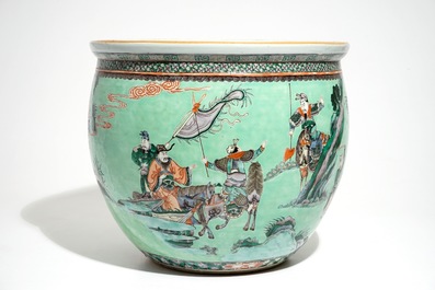 A Chinese famille verte green-ground fish bowl with warriors on horseback, 19th C.