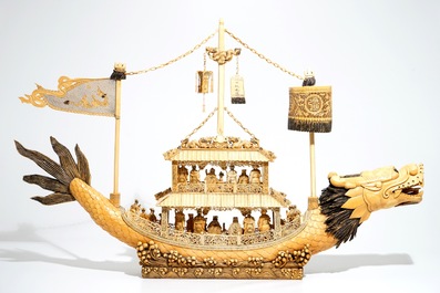 A very large Chinese carved ivory model of a dragon boat, 19th C.