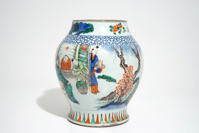 A Chinese olive-shaped wucai vase with figures, 19th C.
