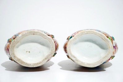 A pair of Chinese famille rose relief-decorated mandarin vases, Qianlong