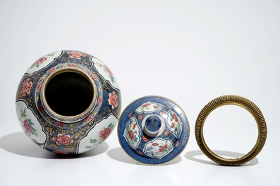 A Chinese bronze-mounted famille rose on blue-ground baluster vase and cover, Yongzheng