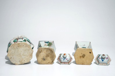 A Chinese famille verte vase with animals, Kangxi, with a pair of famille rose vases and covers, Qianlong